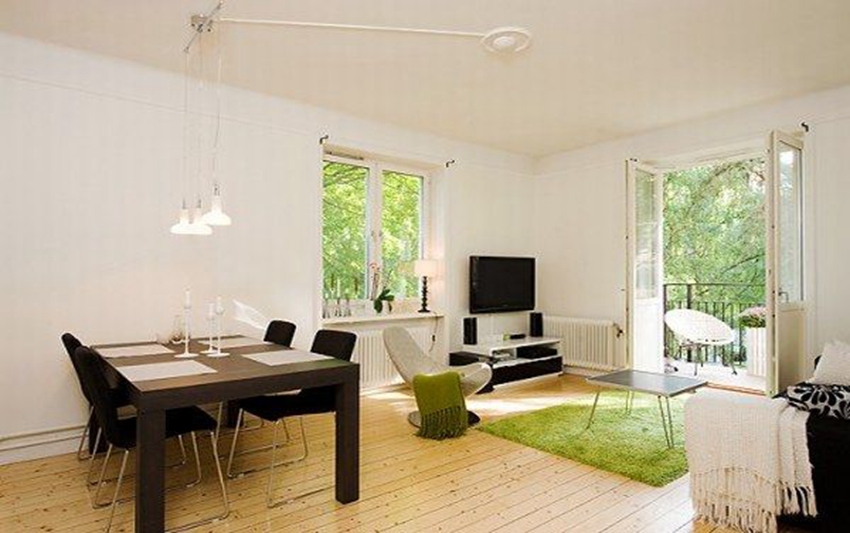 apartment with light wood floors painted white walls 1 554x3 877b6