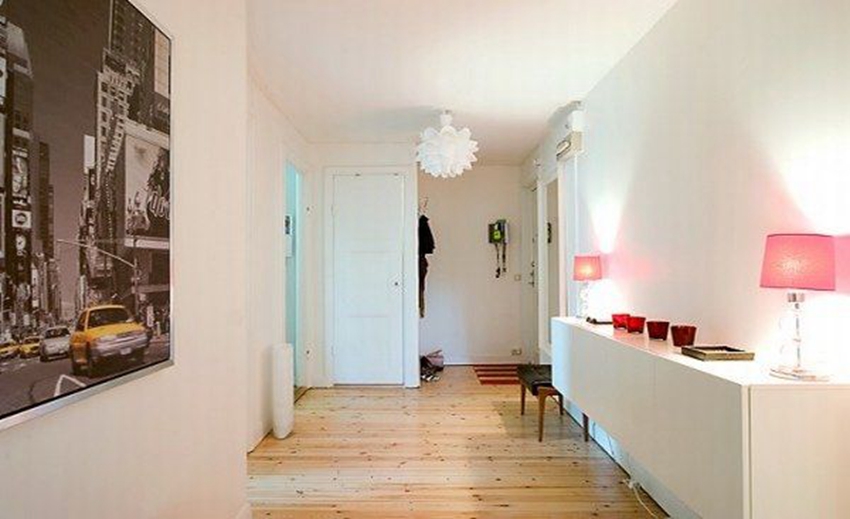 apartment with light wood floors painted white walls 12 554x faed6